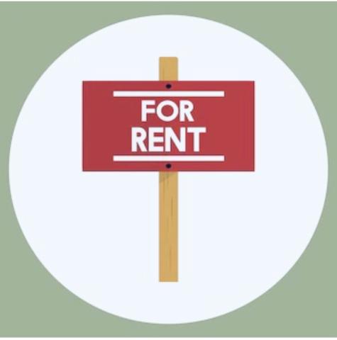 Sign on a pole saying ‘for rent’ 