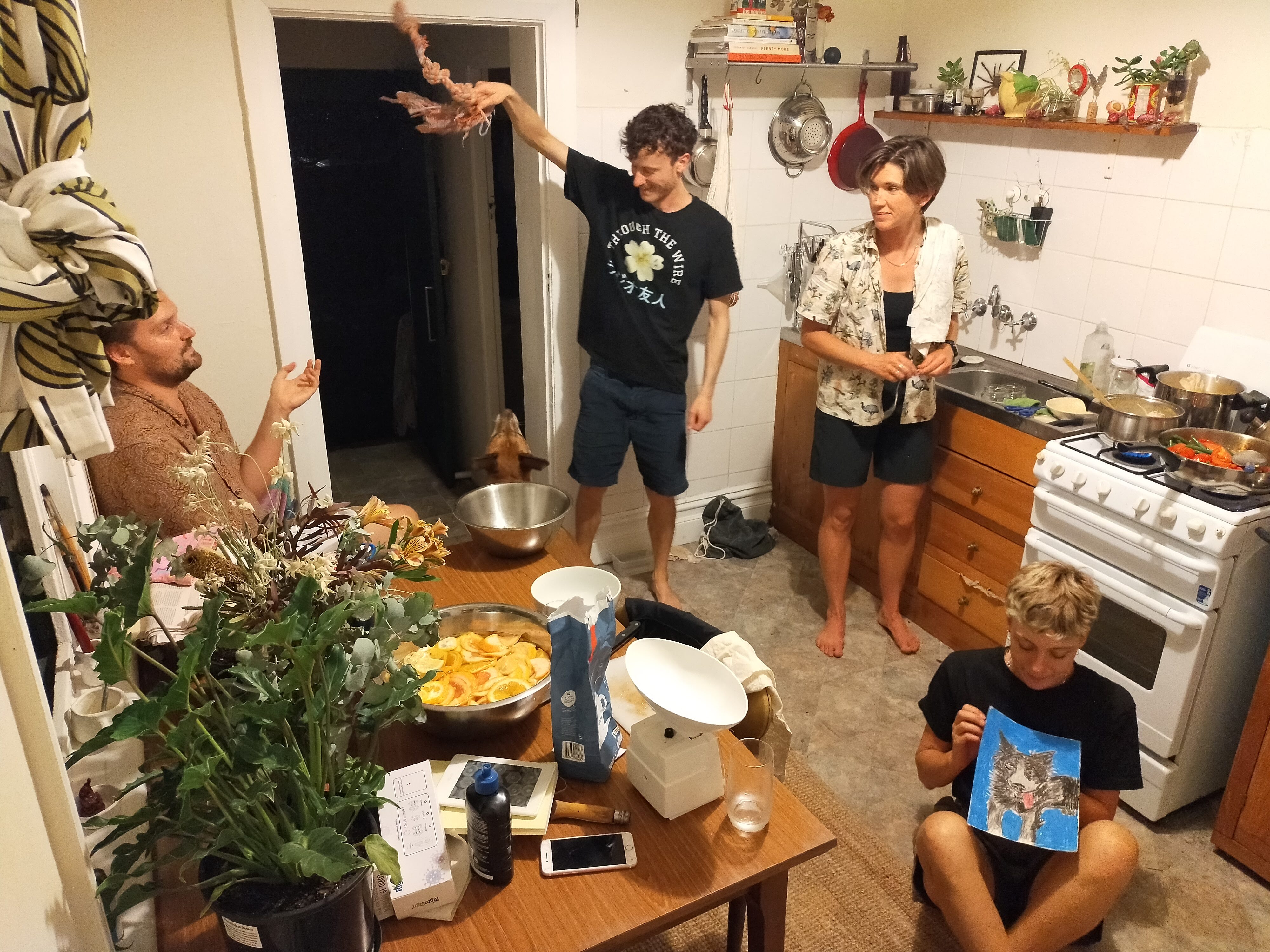 A group of people in a kitchen